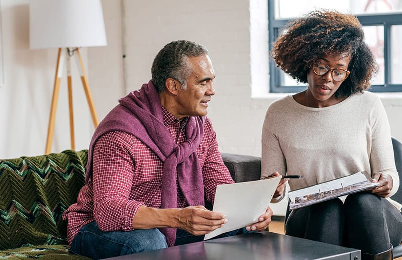 A shot of a man and a woman having business.