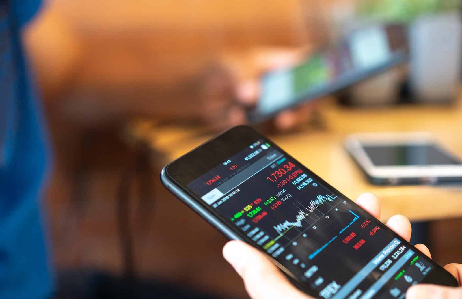 A close up shot of a person's handling a phone.