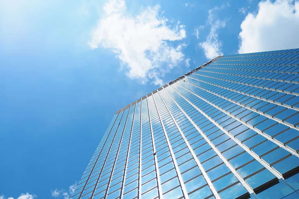 An up-close image of a tall building.