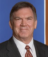 A professional headshot of Michael J. Casey.