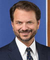 A professional headshot of Robert LeBeau.