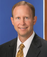 A professional headshot of Robert W. Renken.
