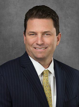 A professional headshot of Robert Levy.