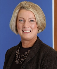 A professional headshot of Virginia L. Sjoberg.
