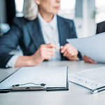 Close-up of business women having discussion.